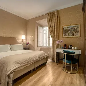 https://trevi-luxury-rooms.it-romehotels.com